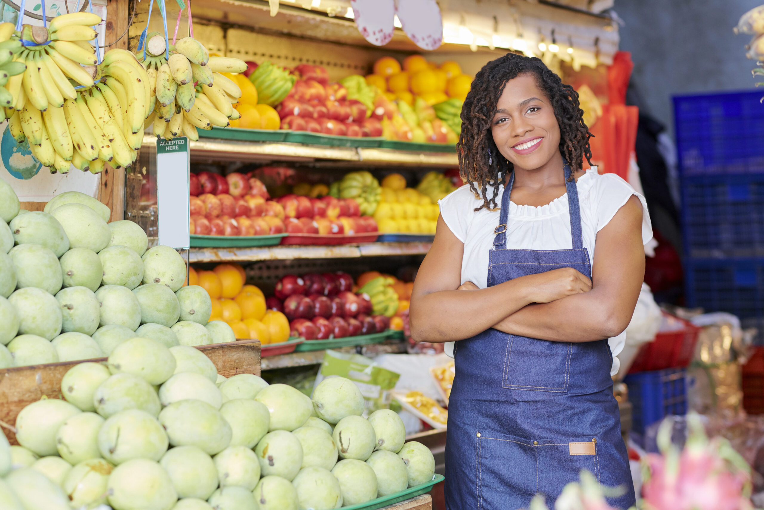 Cheerful woman working in supermarket